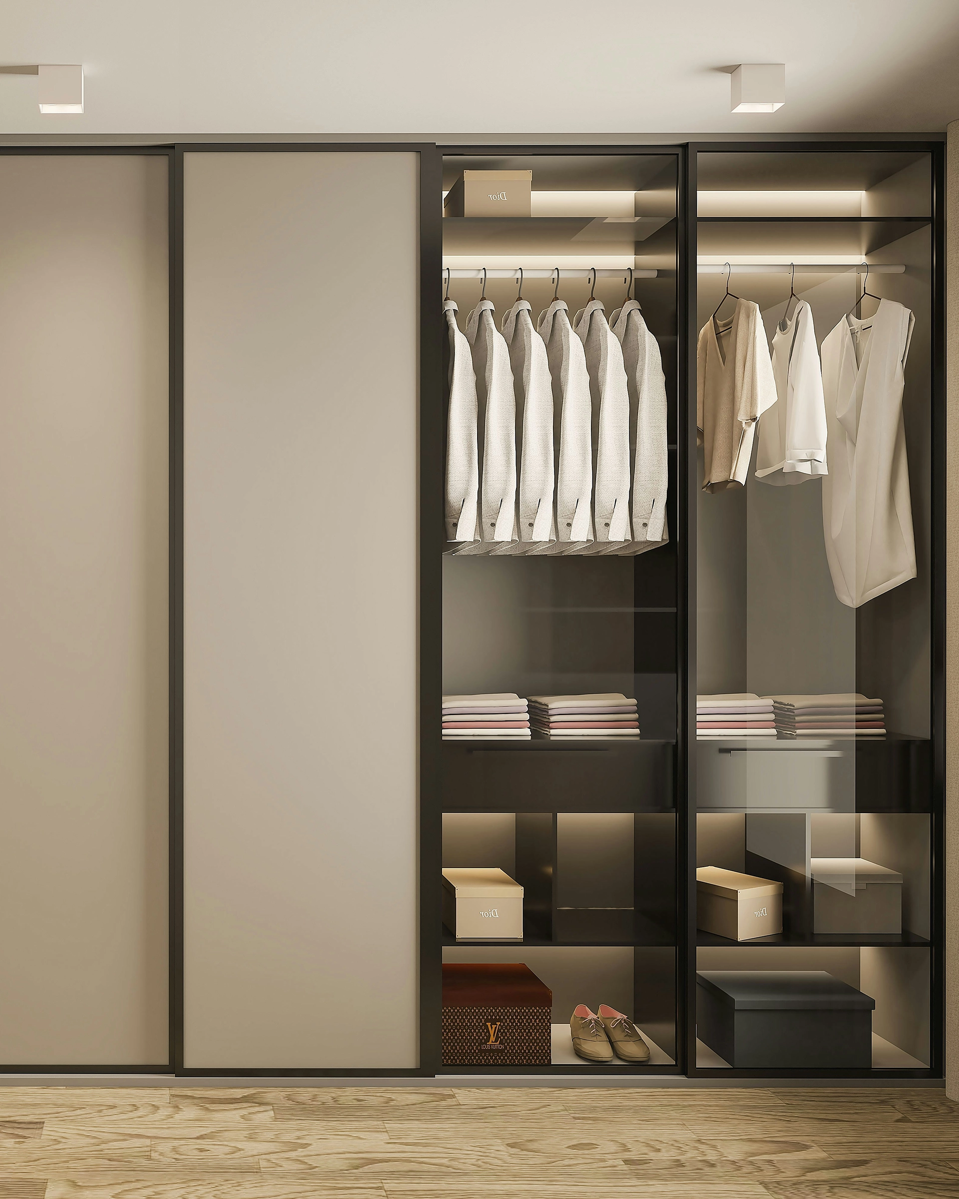 Modern wardrobe with glass doors showing beige jackets, folded clothes, branded boxes, and shoes inside.