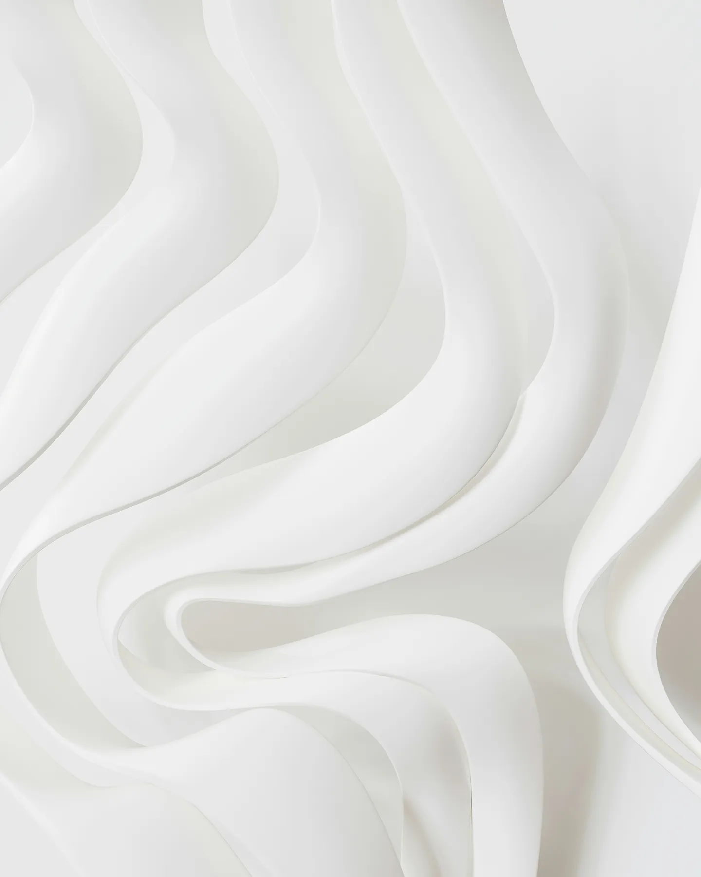 Abstract white sculptural waves with smooth, flowing curves and layered shapes.