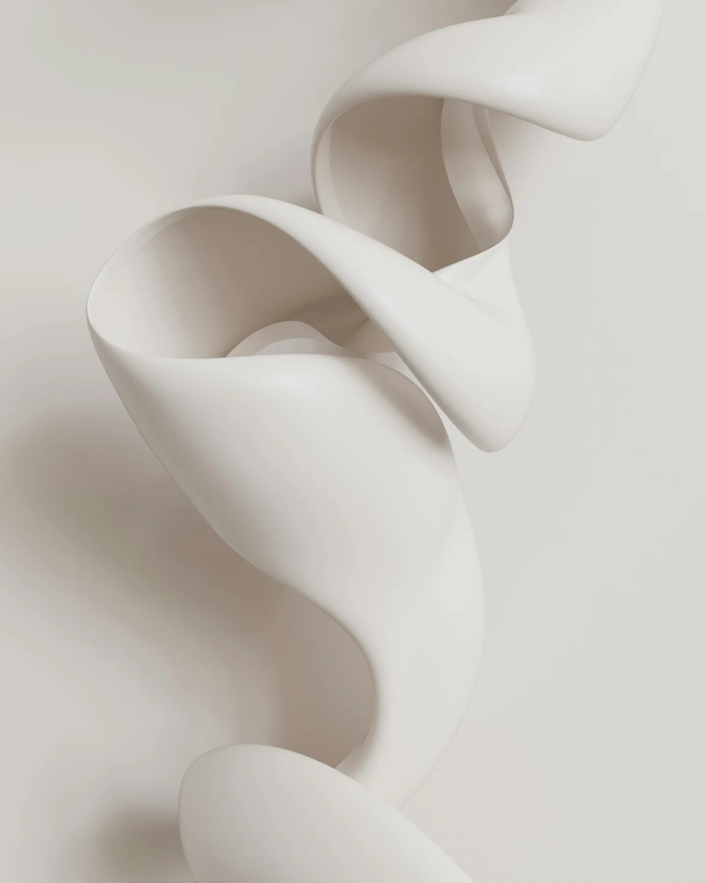 Smooth, curved abstract white sculpture with flowing, ribbon-like shapes against a light background.