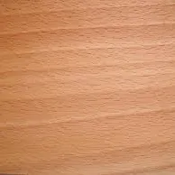 Close-up of smooth light brown wood grain texture.
