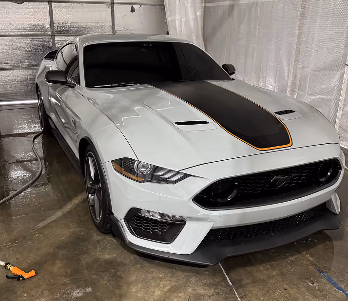 A freshly detailing sports car in a detailing shop in Lafayette.