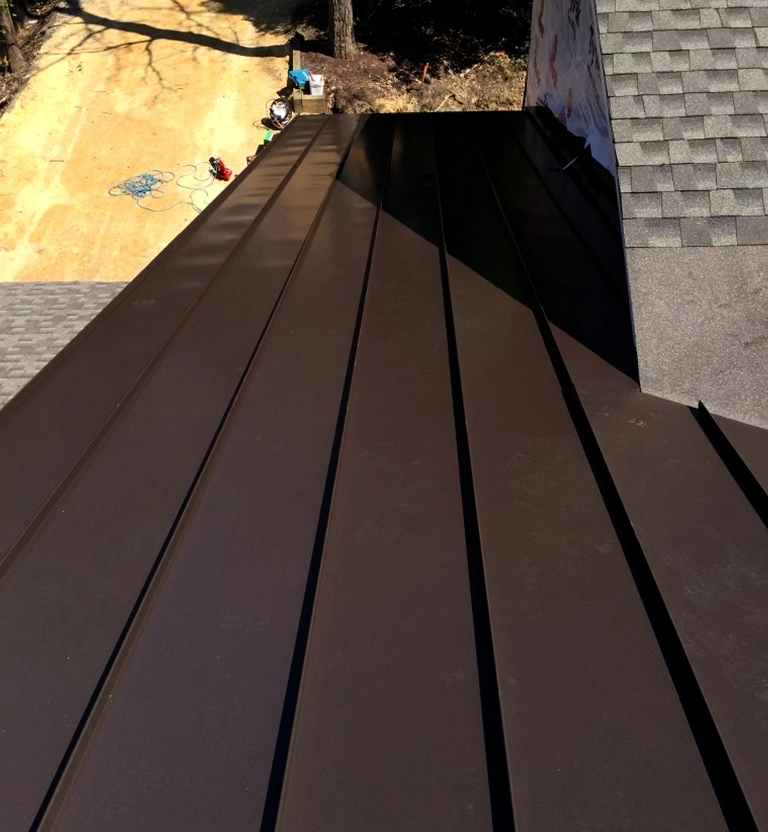 Brown metal standing seam roof installed in NC.