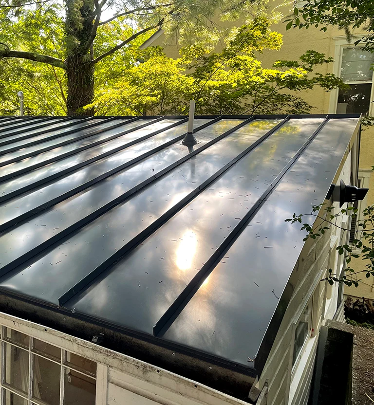 Metal standing seam accent roof installed in Coastal Carolina. 