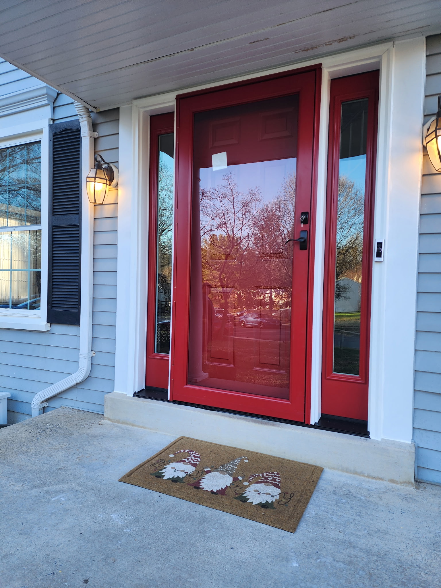 Red Entry Door with Sidelites and a Storm Door Installation in Wilmington NC