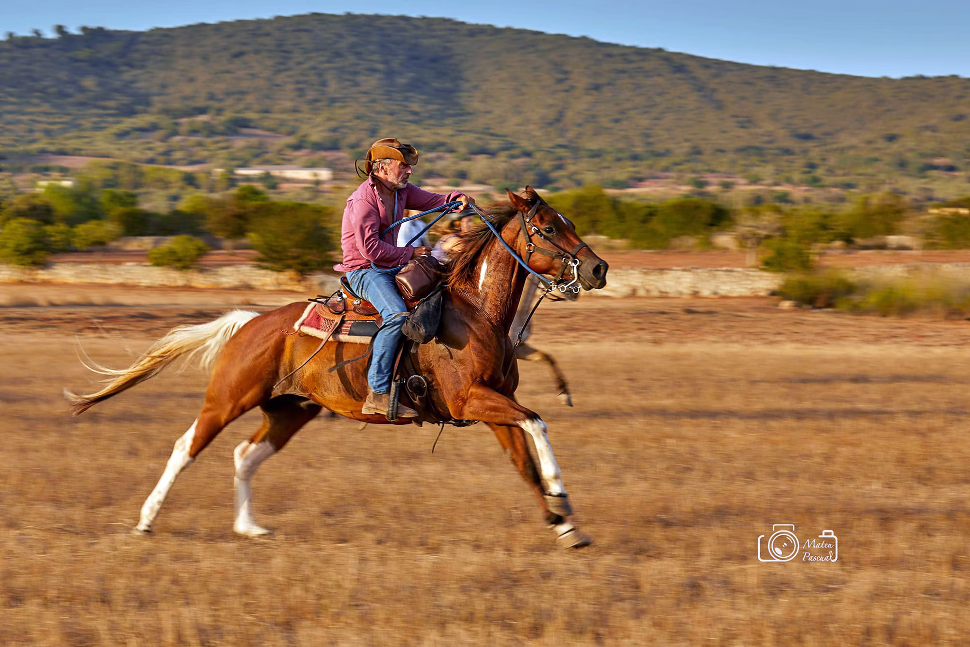 Rider galloping on a trail riding holiday in Menorca Spain