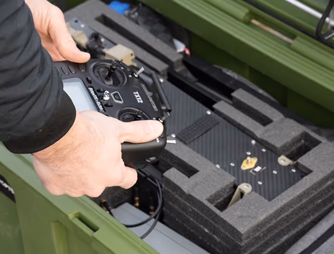 Image of hands holding a remote control