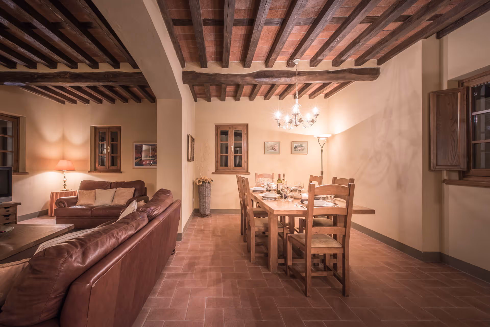 Dining and living room area with long wooden table