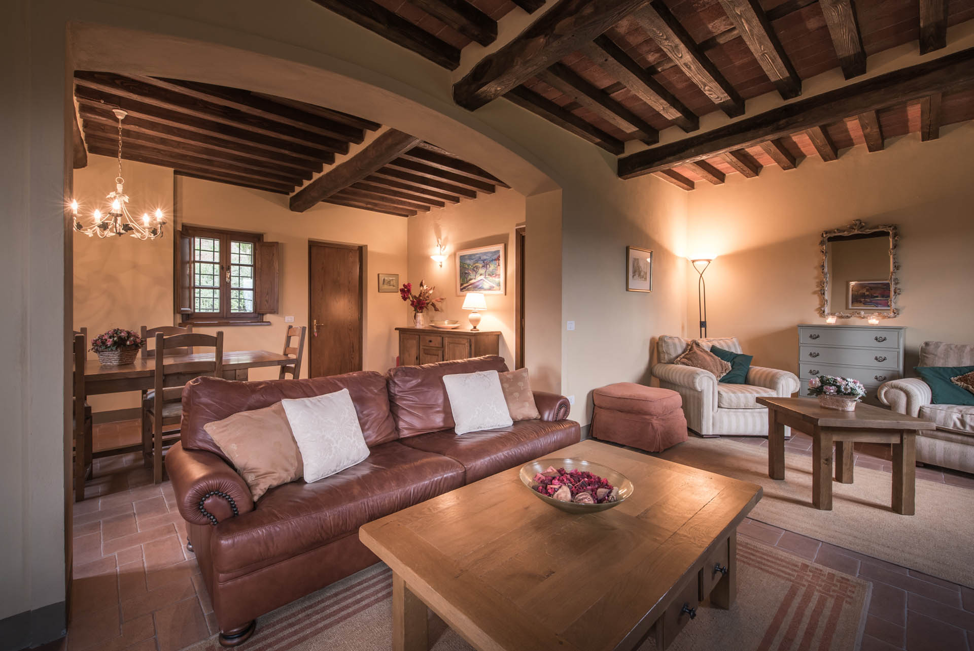 Cozy sitting room in the farmhouse with traditional ceiling beams