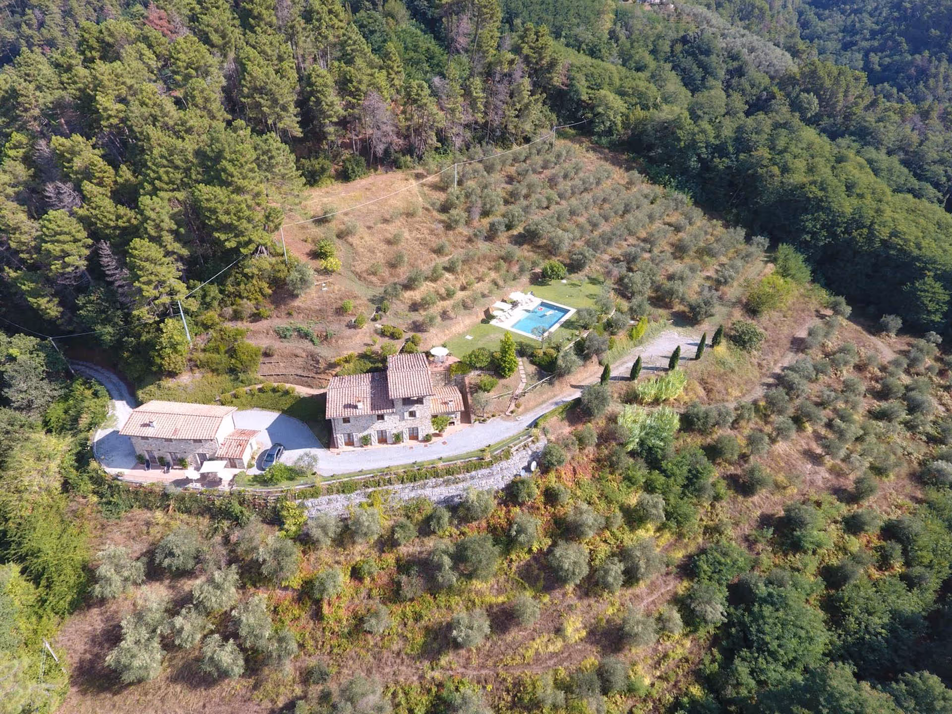 Aerial view of La Pianella farmhouse in the Tuscan hills