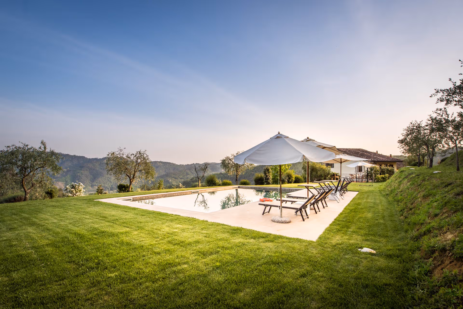 Pool and garden area during golden hour