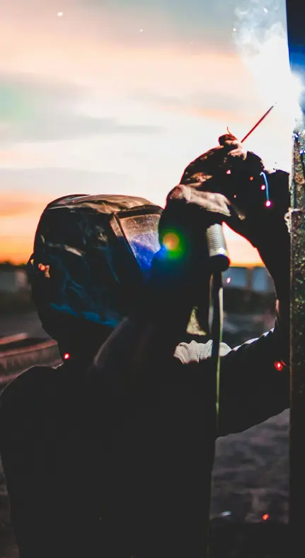 welder working with safety equipment on