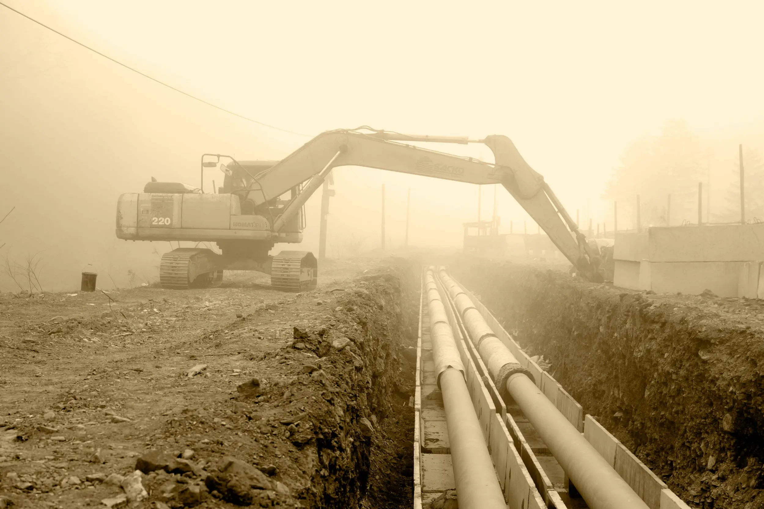 pipes in tunnel with vehicle over
