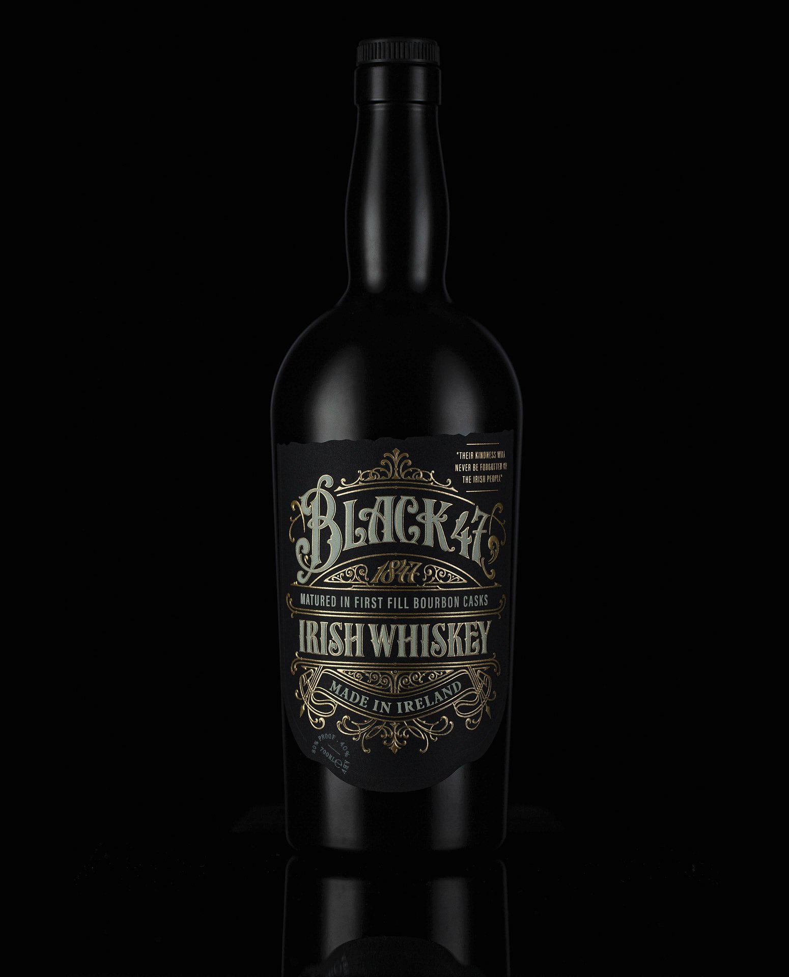 Full Black47 whiskey bottle, front-facing