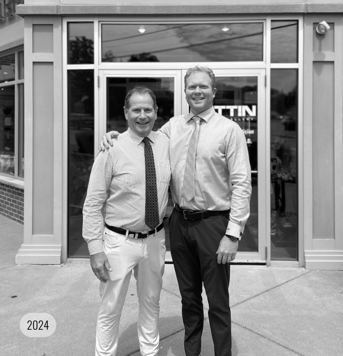 Two generations of the Battin family share a proud moment. 