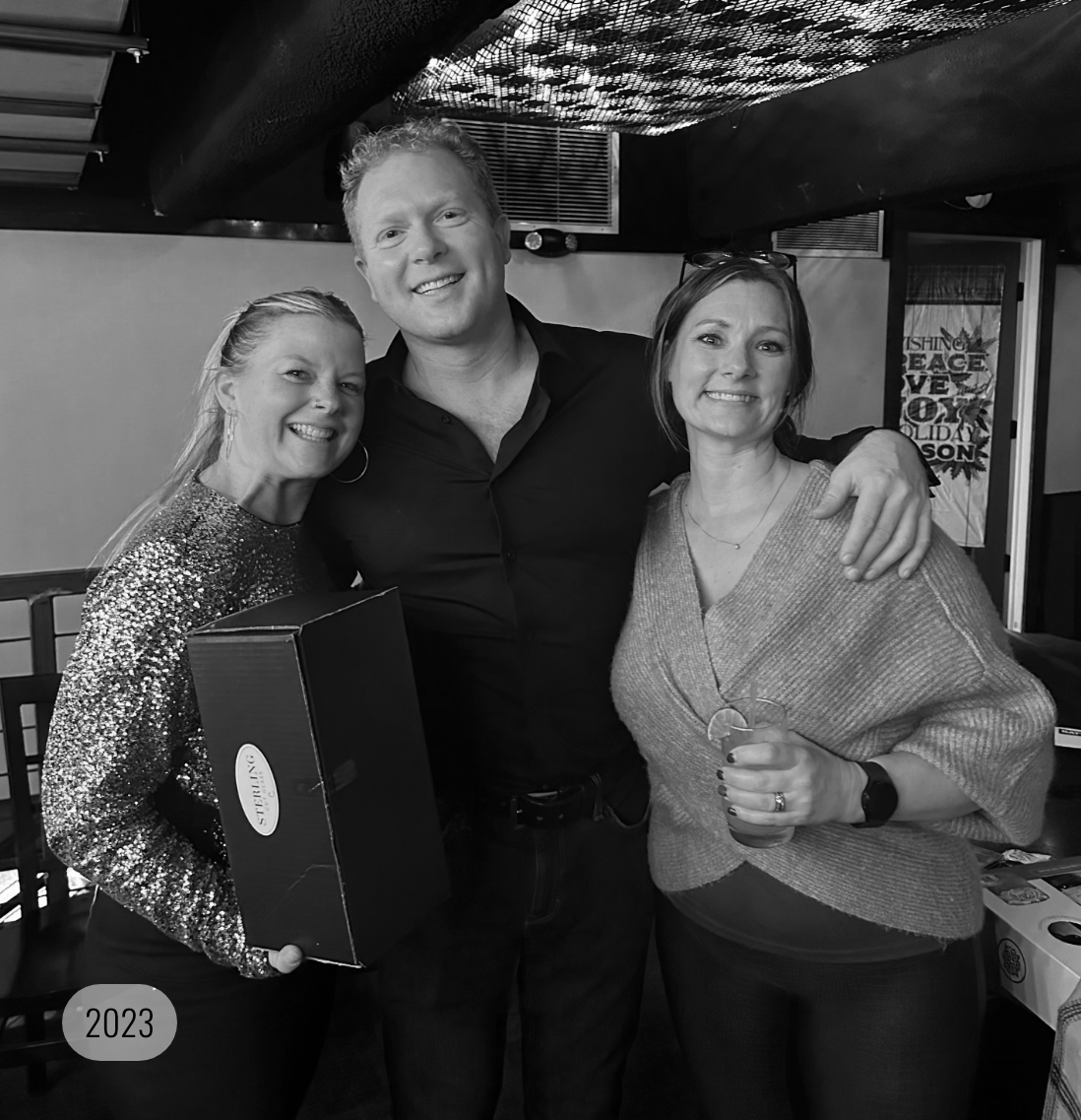 Two generations of the Battin family share a proud moment. 