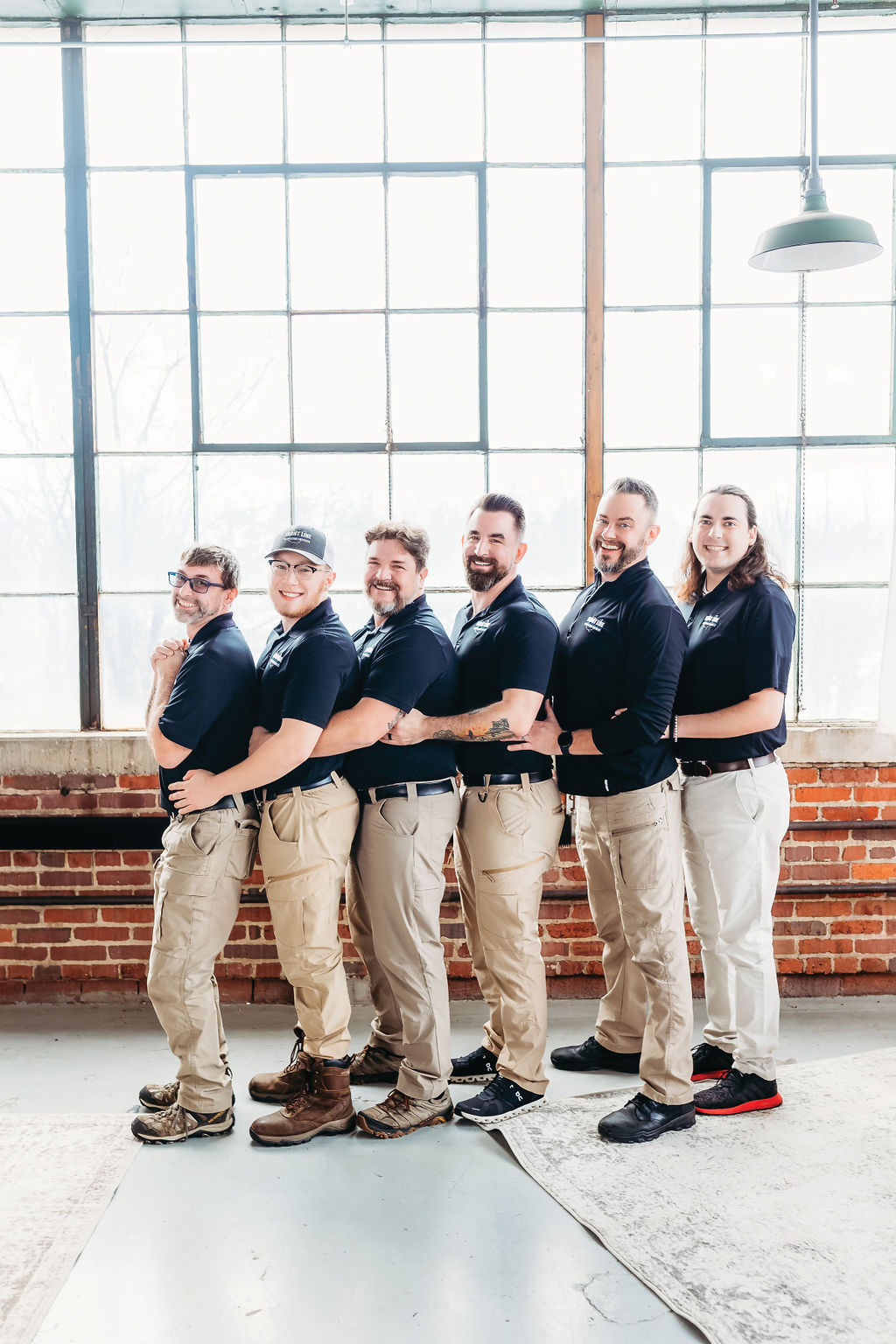 Front Line team photo being silly gooses