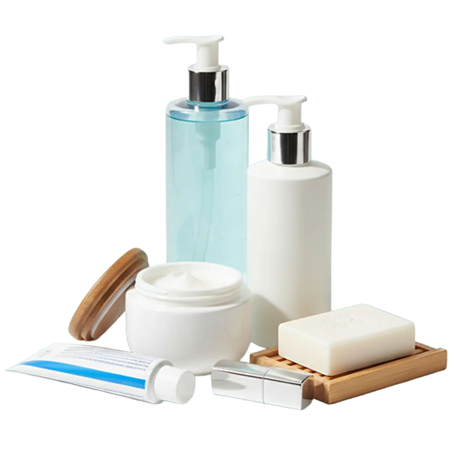 Collection of personal care products including a blue liquid soap dispenser, white cream jar with open lid, white lotion pump bottle, bar soap on wooden tray, a tube, and a silver lipstick case.