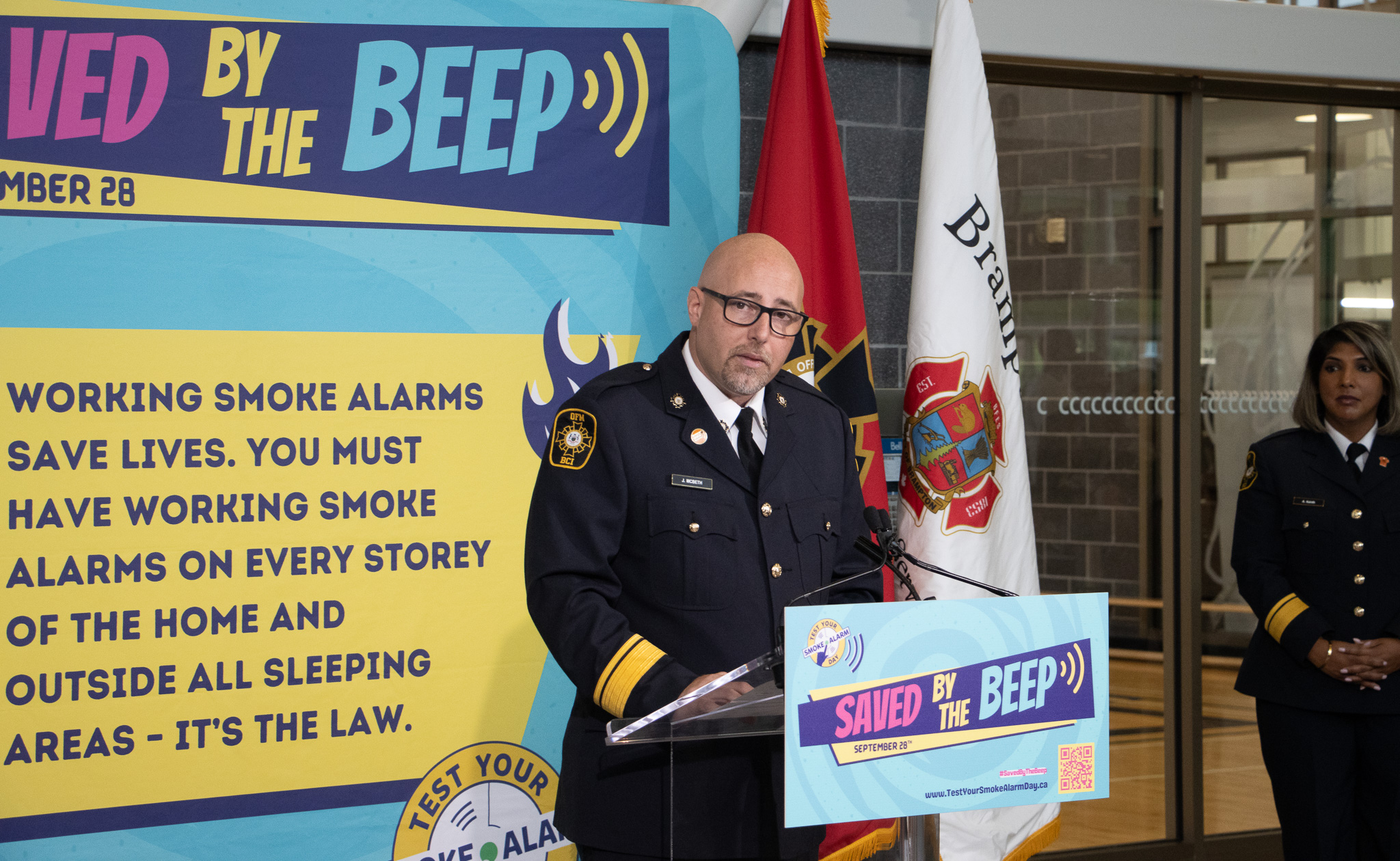 Fire service members at a press conference for Test Your Smoke Alarm Day.