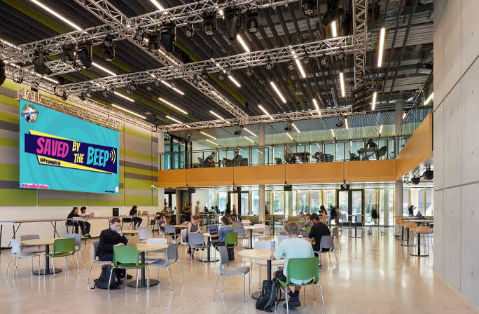 Fanshawe College Student Meeting Space with Saved By the Beep banner on wall