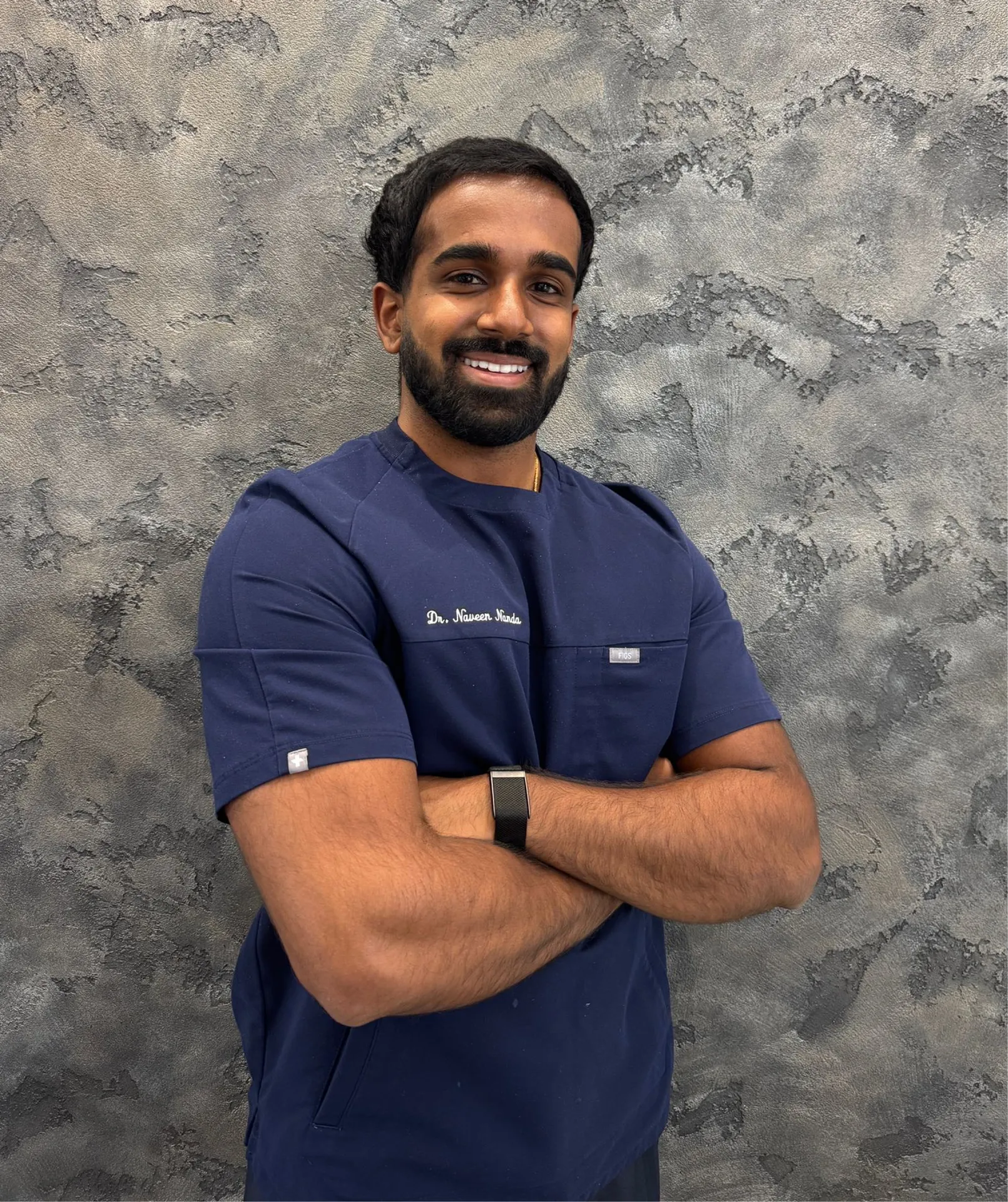 Dr Naveen Nandakumar