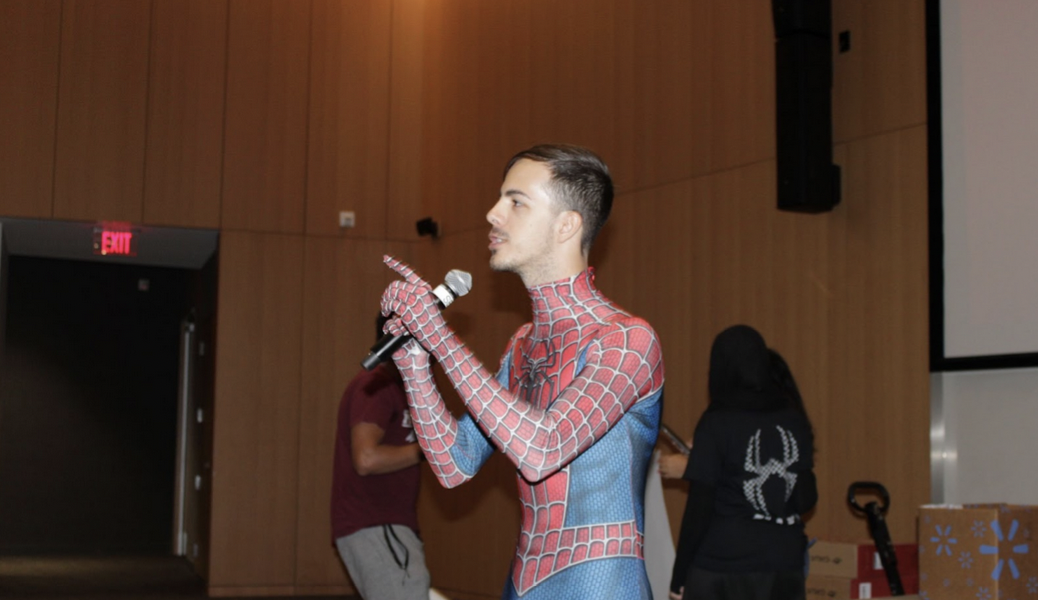 Dominic presenting to HackUTA attendees.