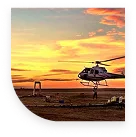 Helicopter in a sunset