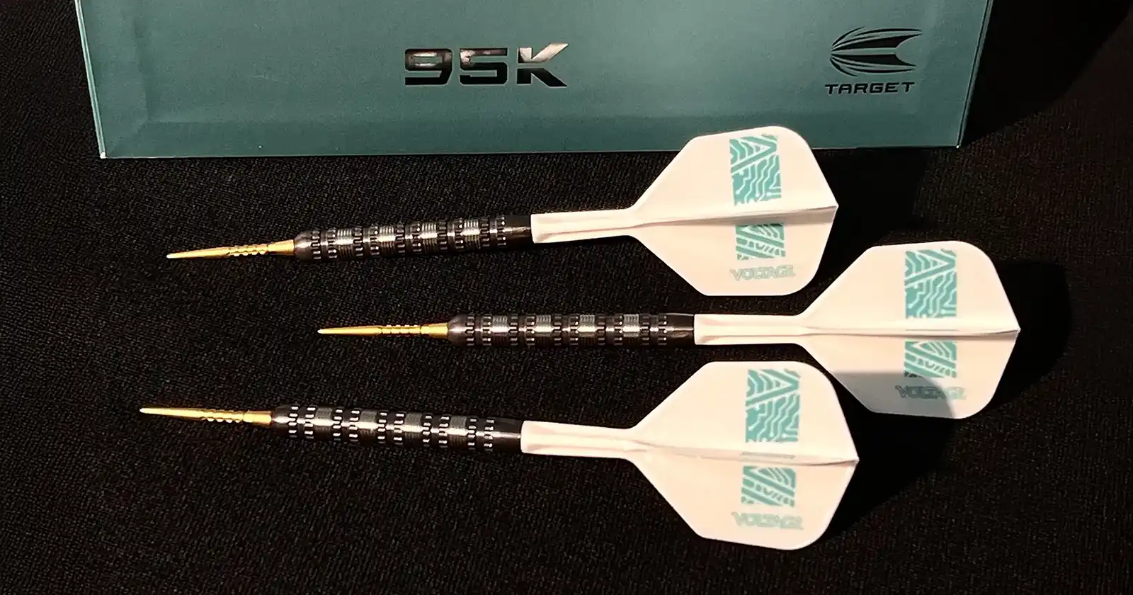 Target Rob Cross 90% Tungsten darts, as used by professional darts player Rob Cross. Steel tip darts with unique grip pattern, displayed with Target logo and "95K" branding.