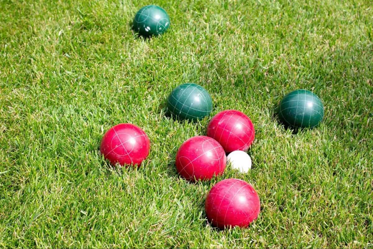 bocce balls in the grass