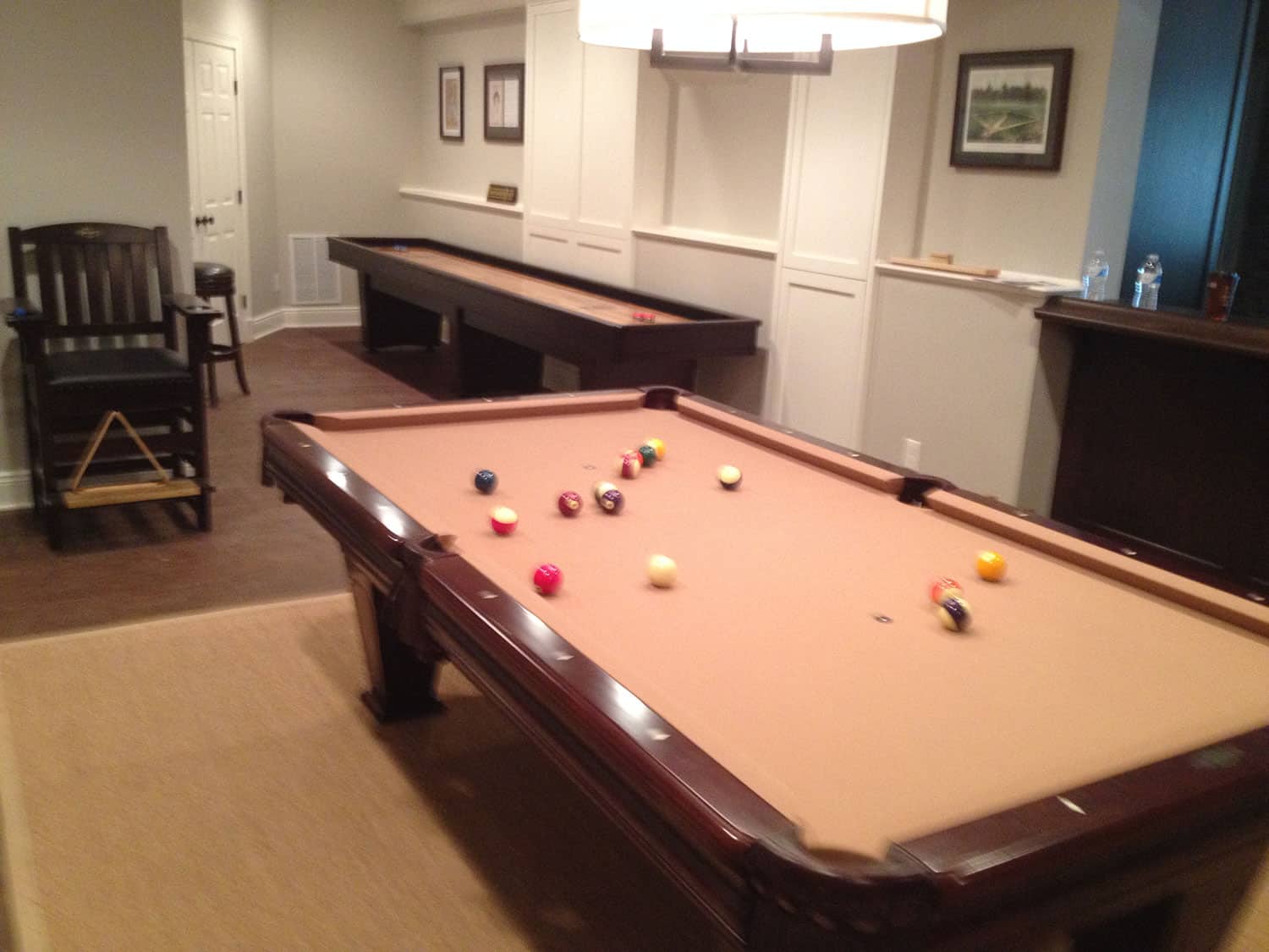 tan pool table and shuffleboard