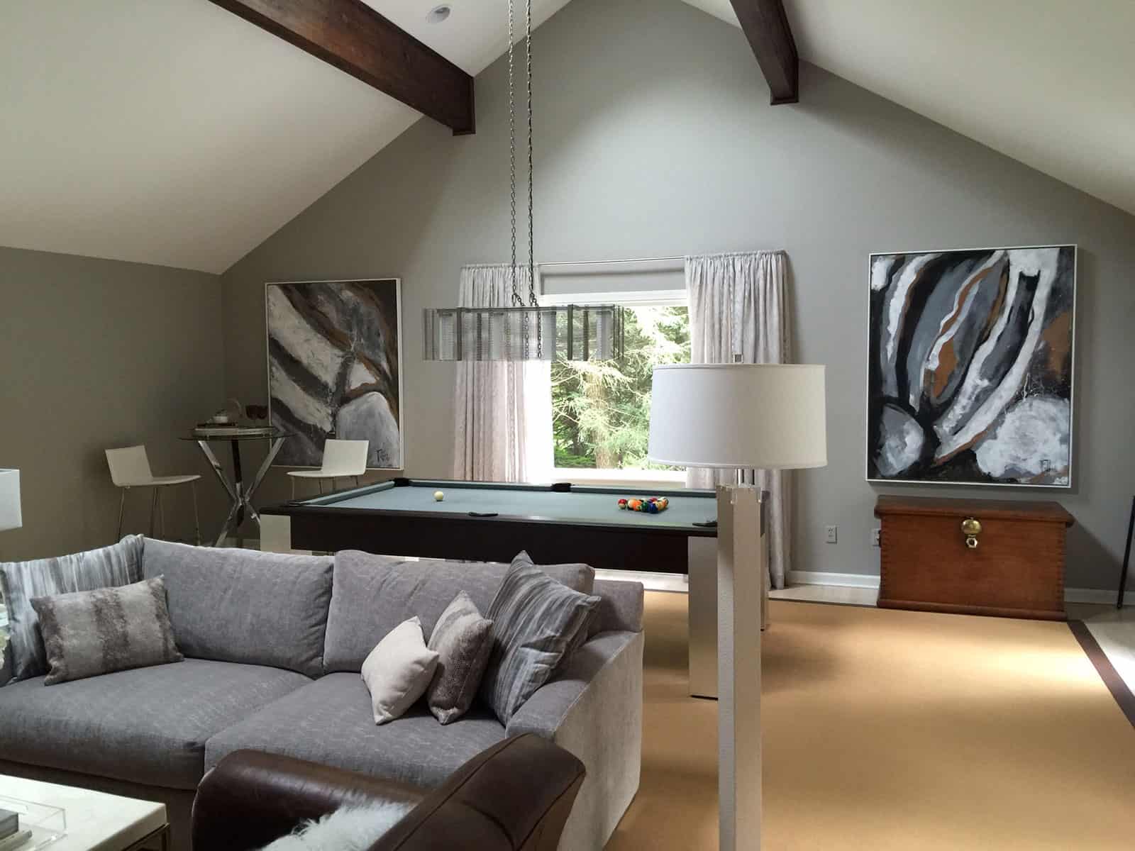 green pool table with fancy billiard lighting