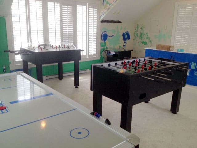 air hockey, bubble hockey and foosball game room