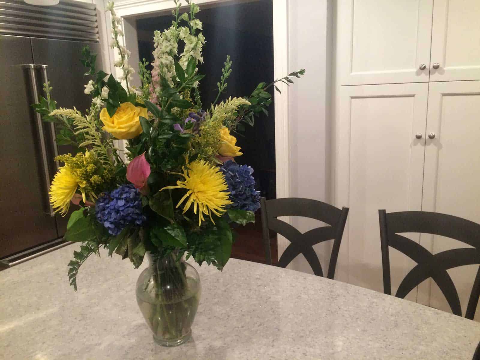 black bar stools with flowers