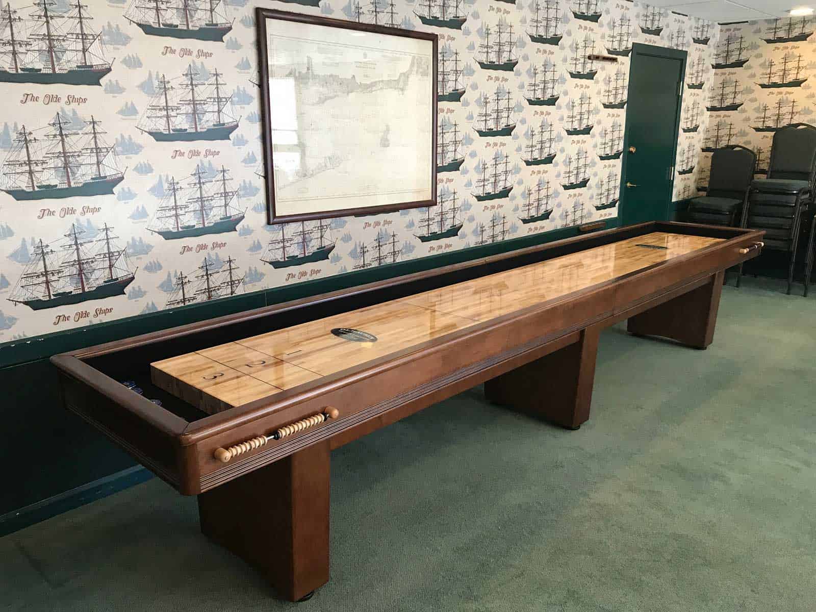shuffleboard with sailboat wallpaper