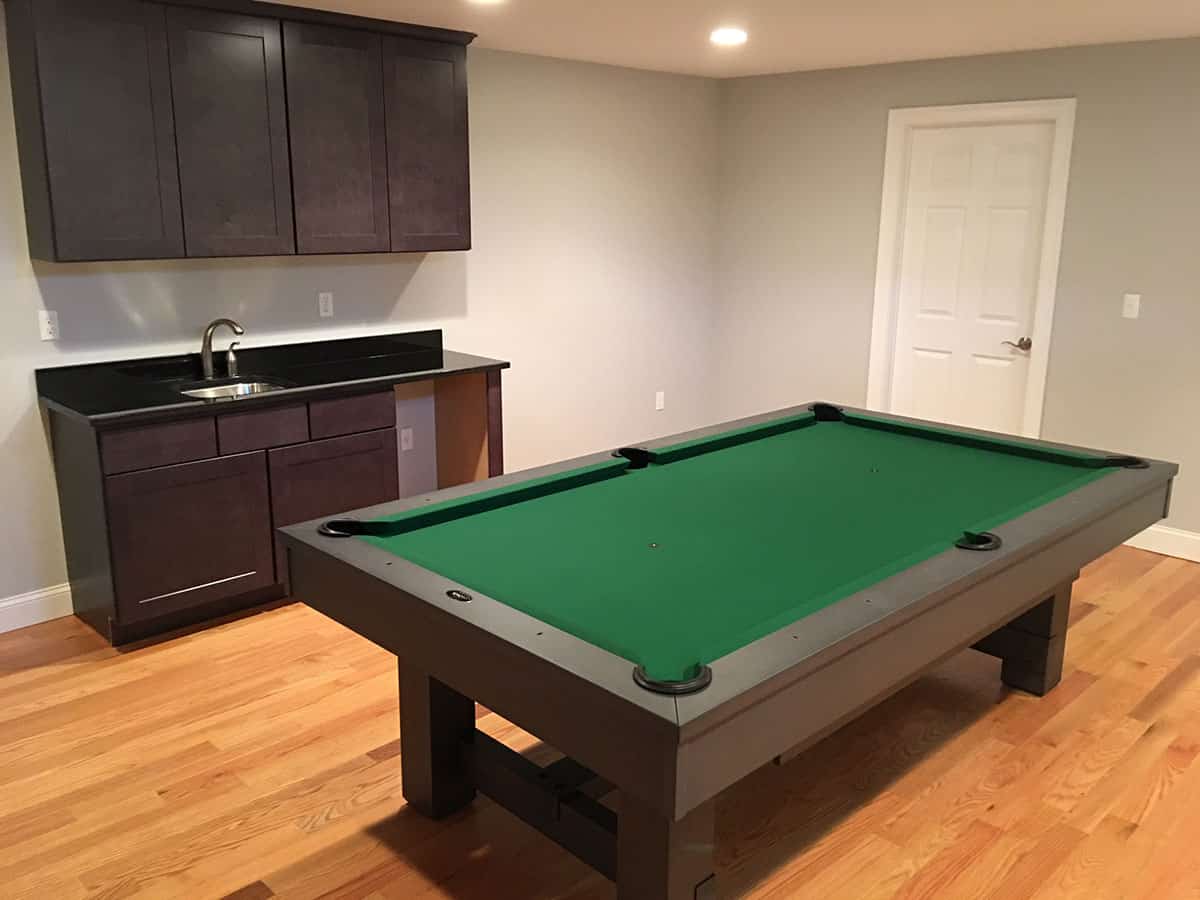 green pool table with wet bar