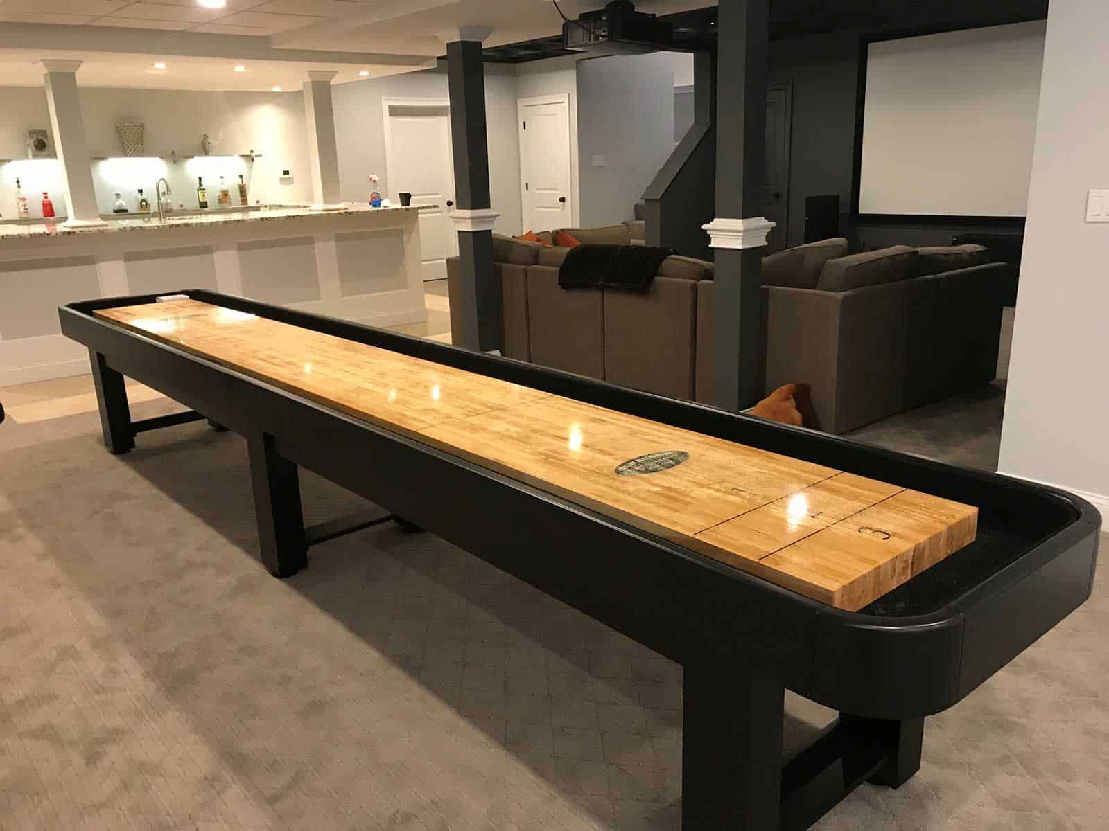 shuffleboard table and a wet bar