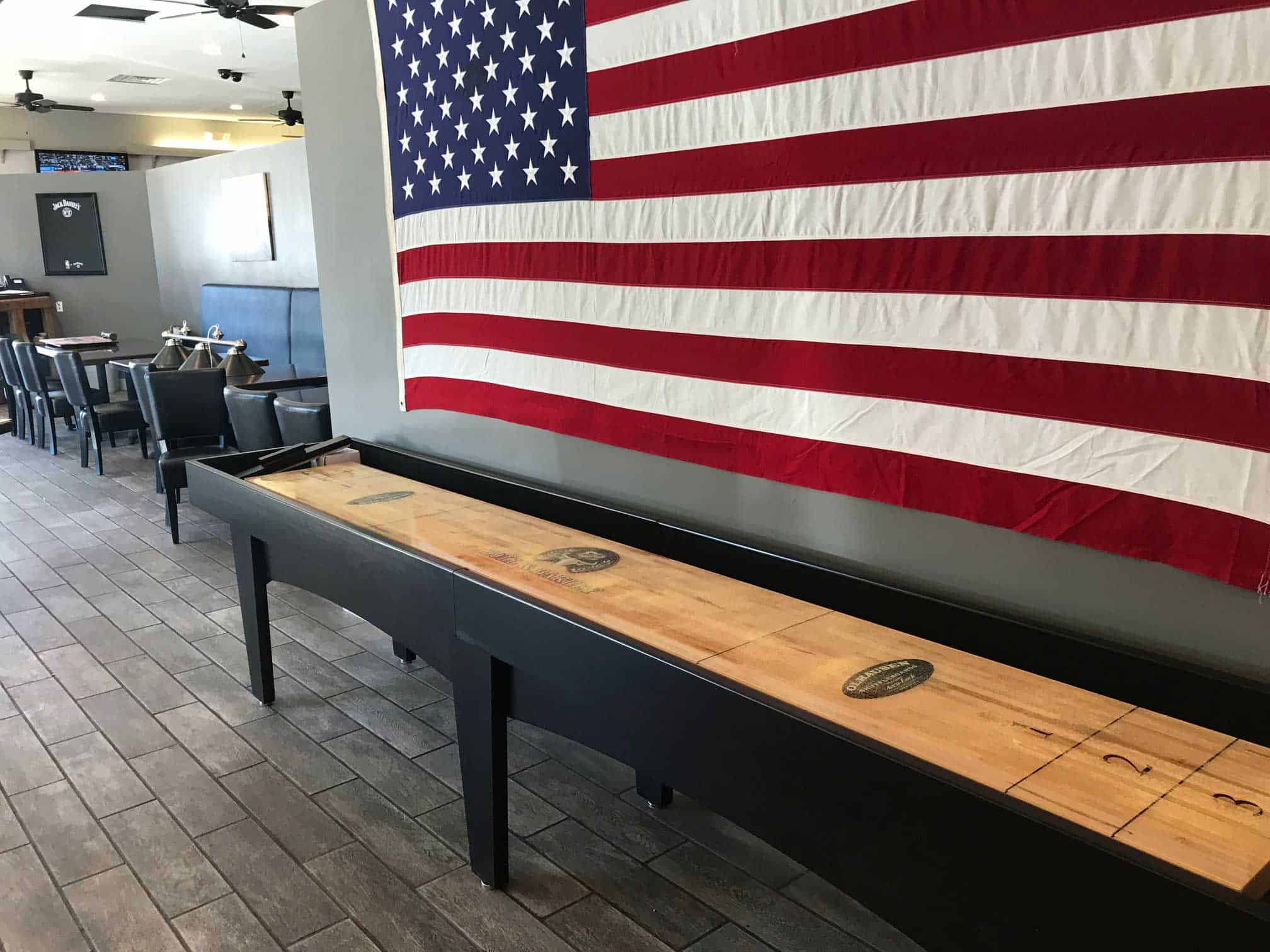 shuffleboard with american flag