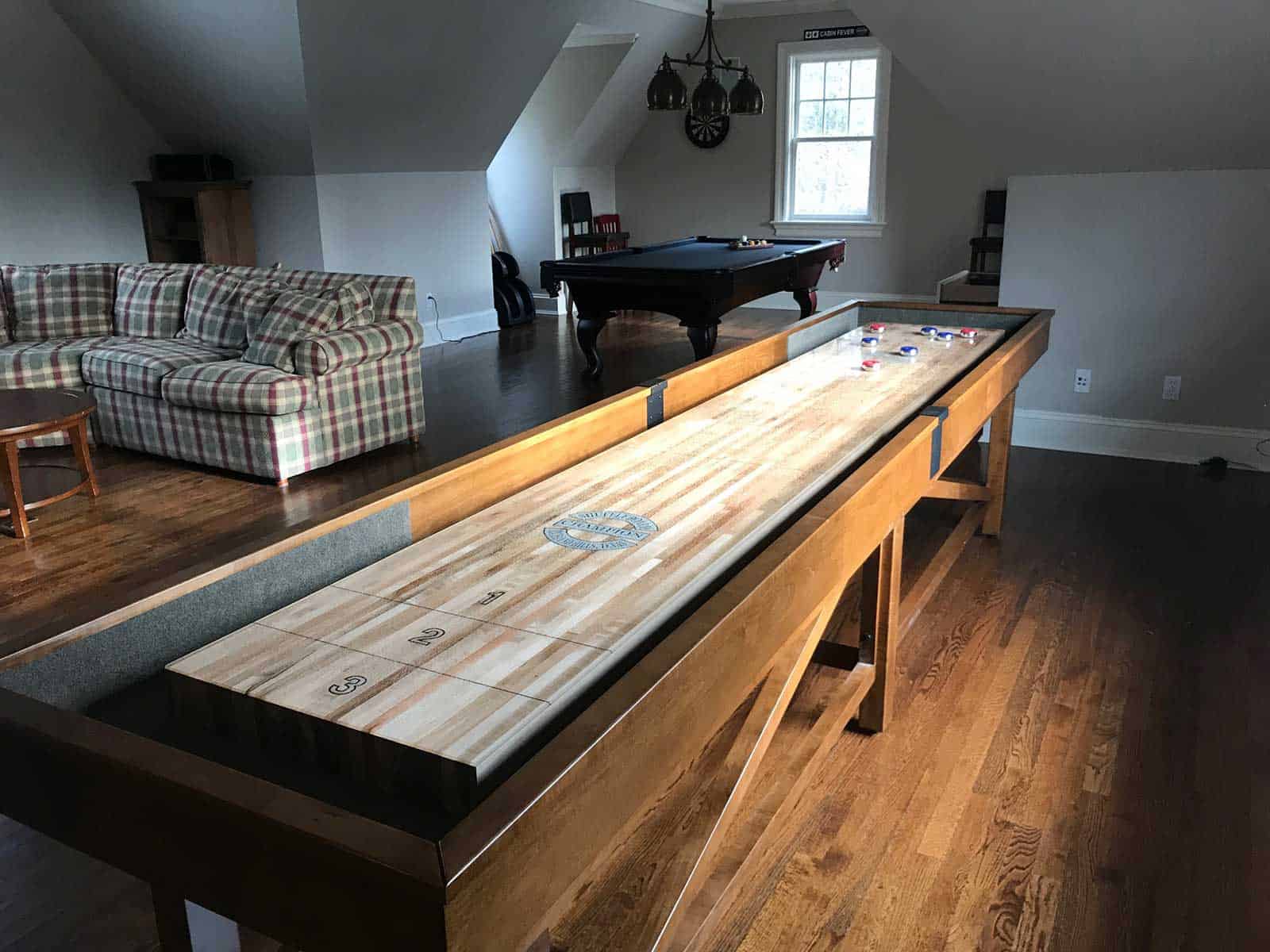 shuffleboard and pool table game room