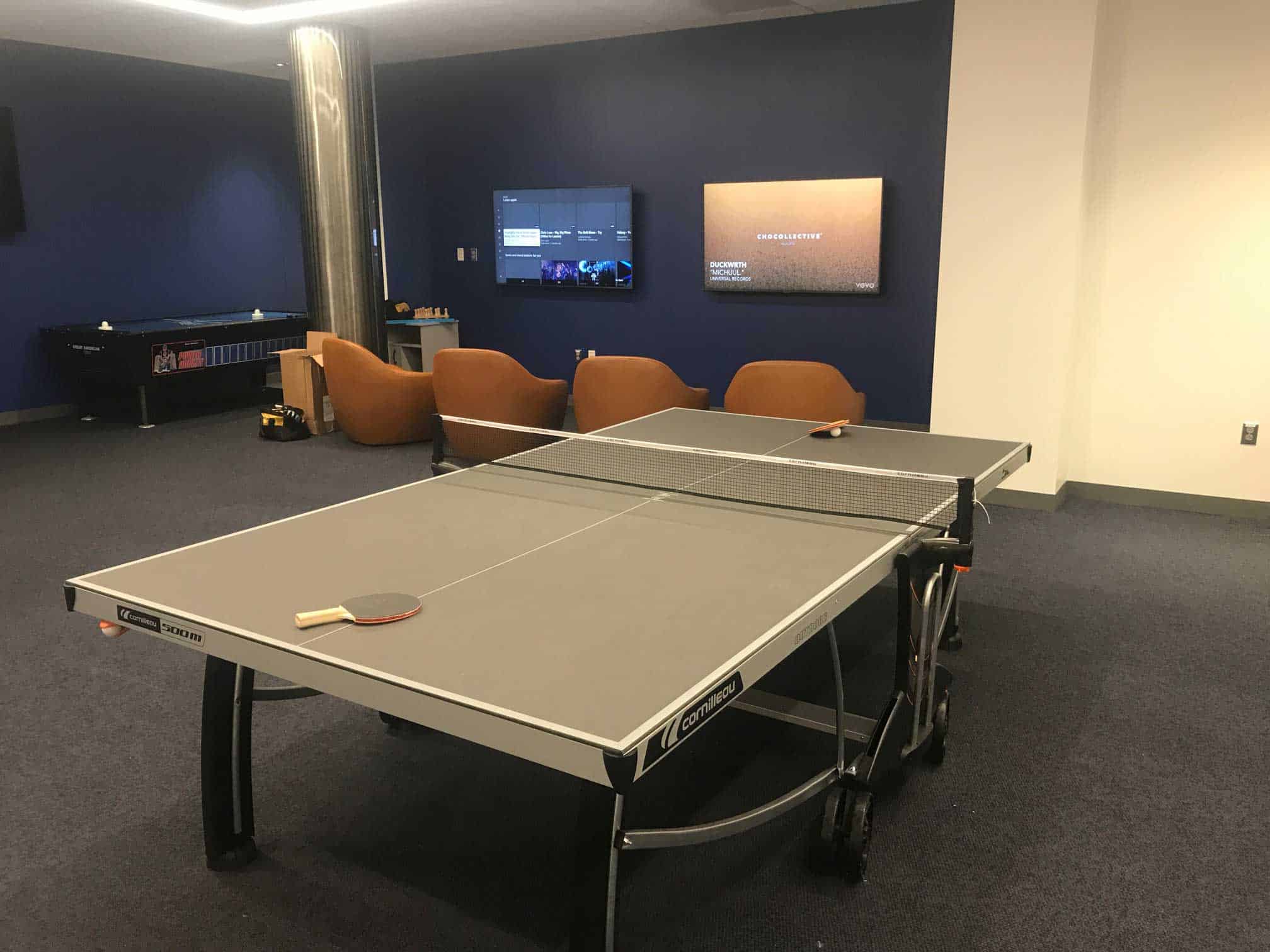 albertus magnus table tennis ping pong with air hockey in the background
