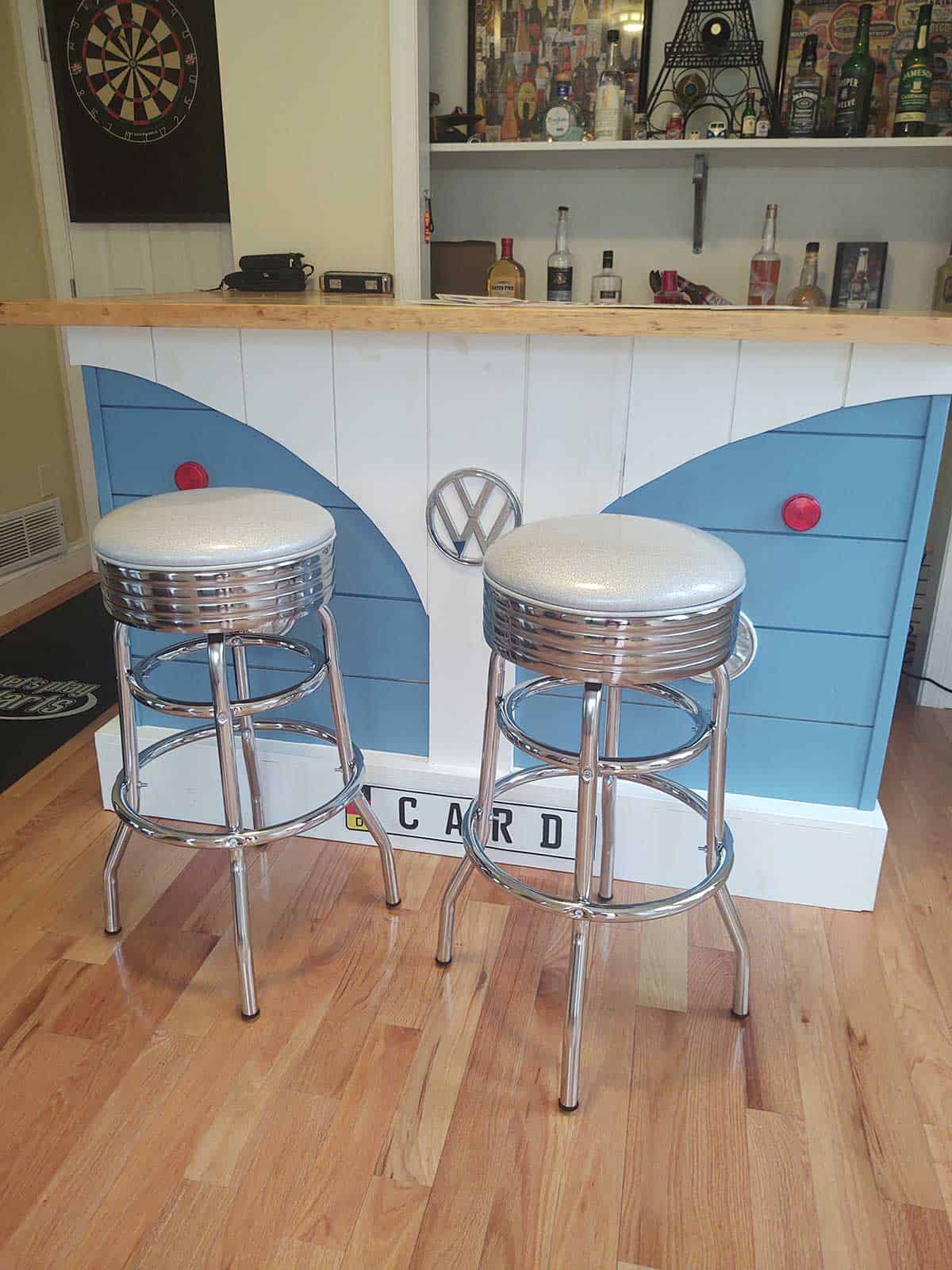 barstools in front of volkswagen microbus bar