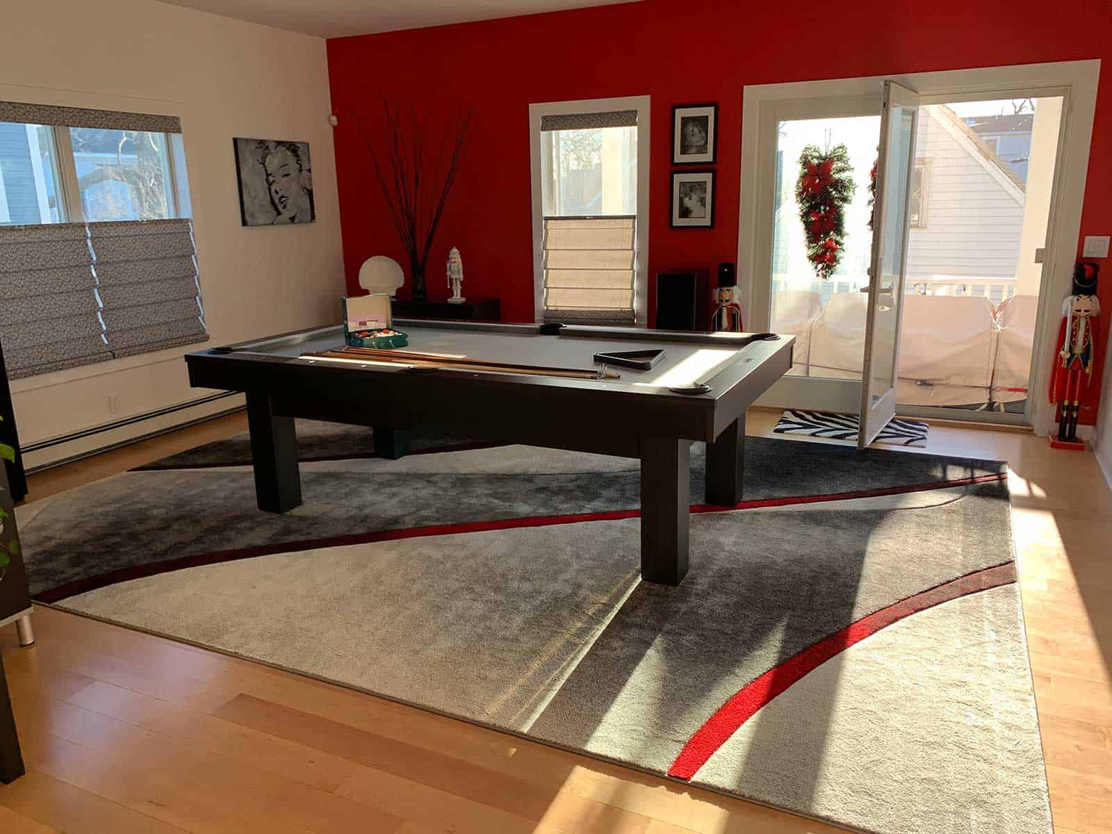 pool table in a red room