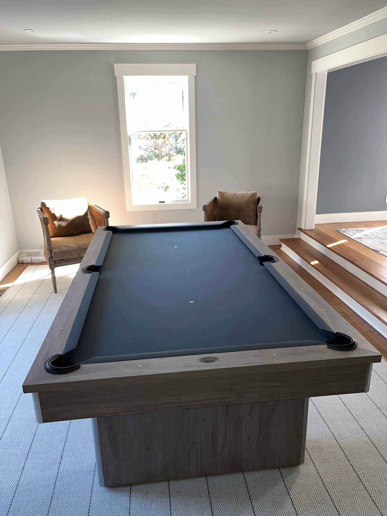 black pool table with brown trim