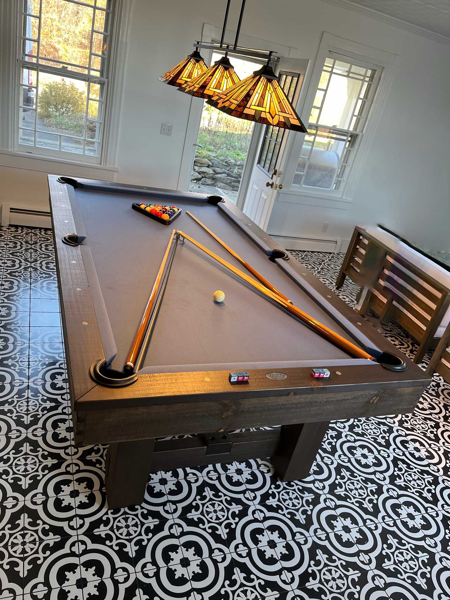 nice tile and lighting with a pool table