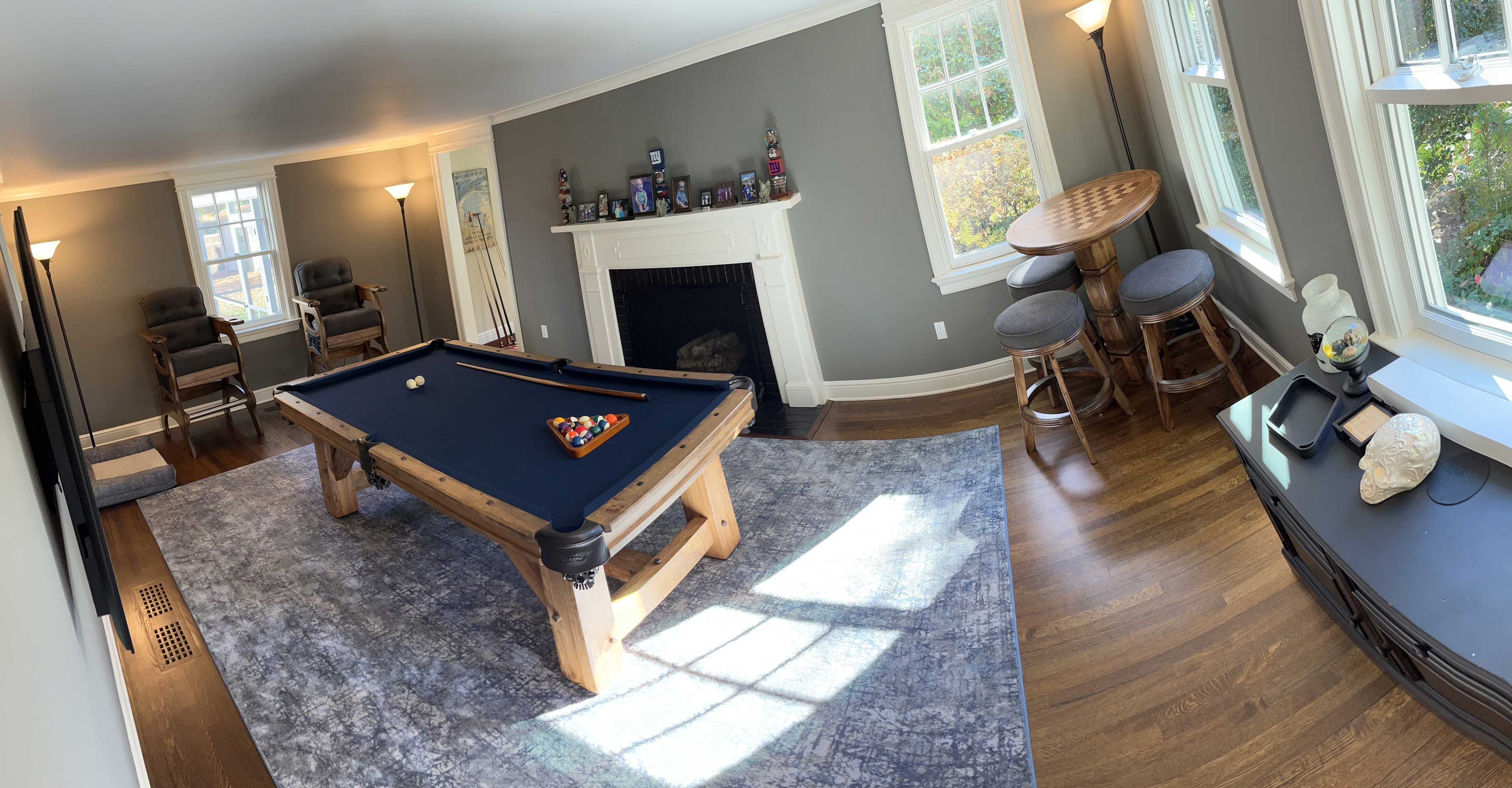 game room with pool table and game table