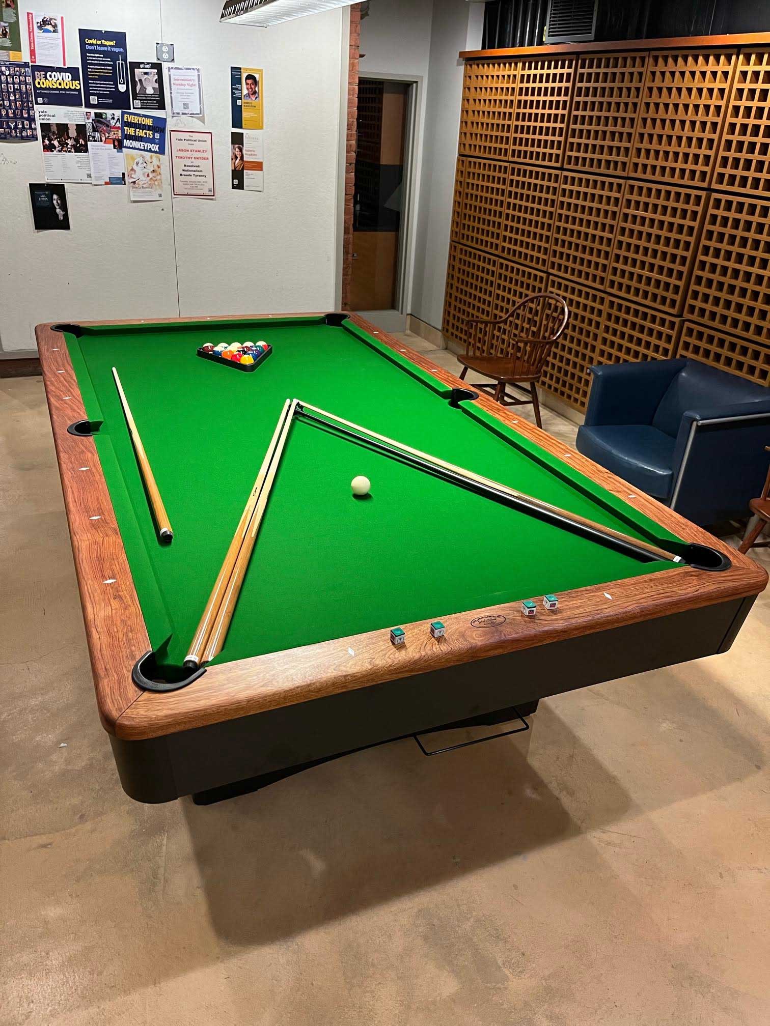 Green Olhausen pool table at Yale