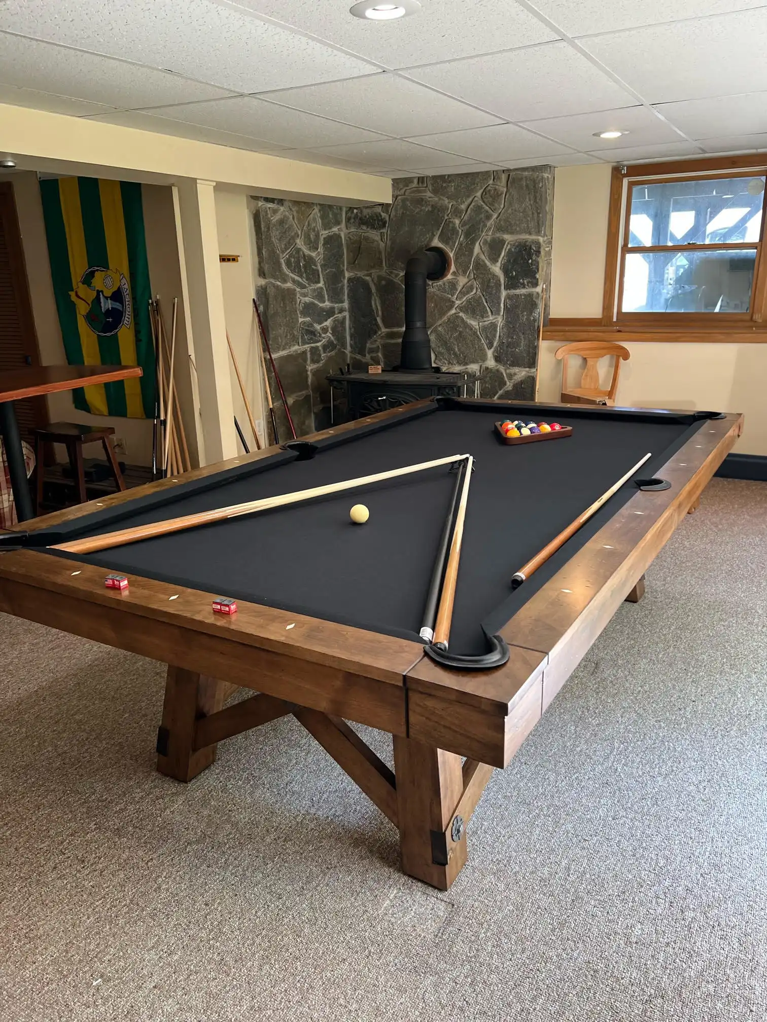 black covered pool table in Ludlow VT