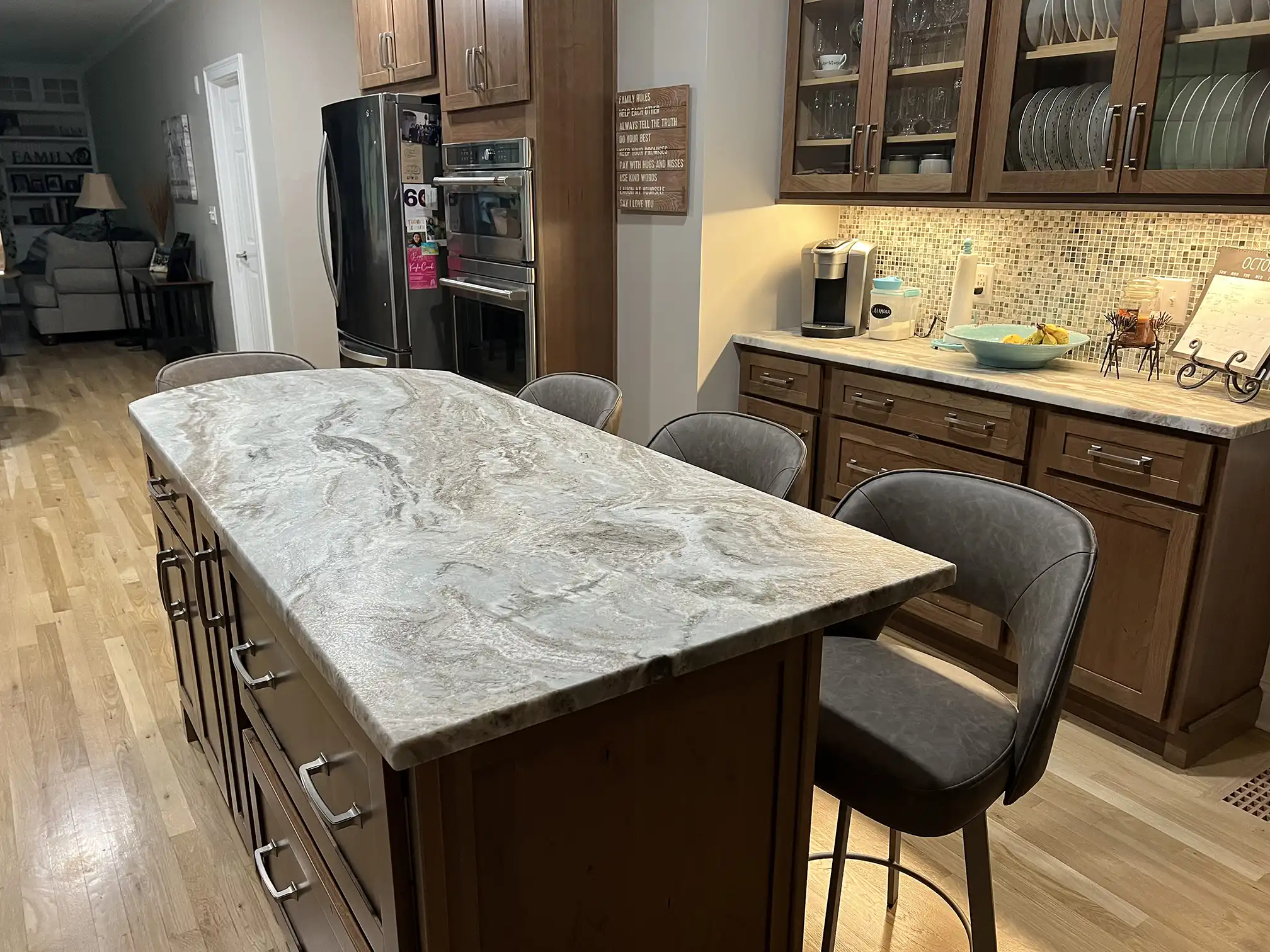 black kitchen stools at a kitchen island