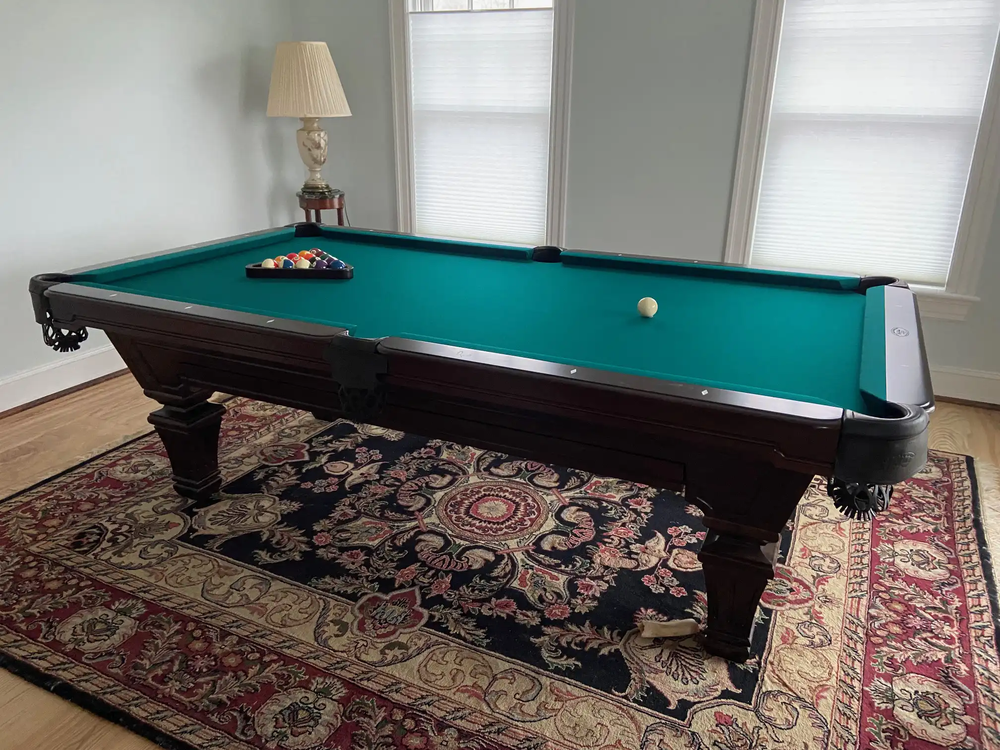 Olhausen pool table with green felt
