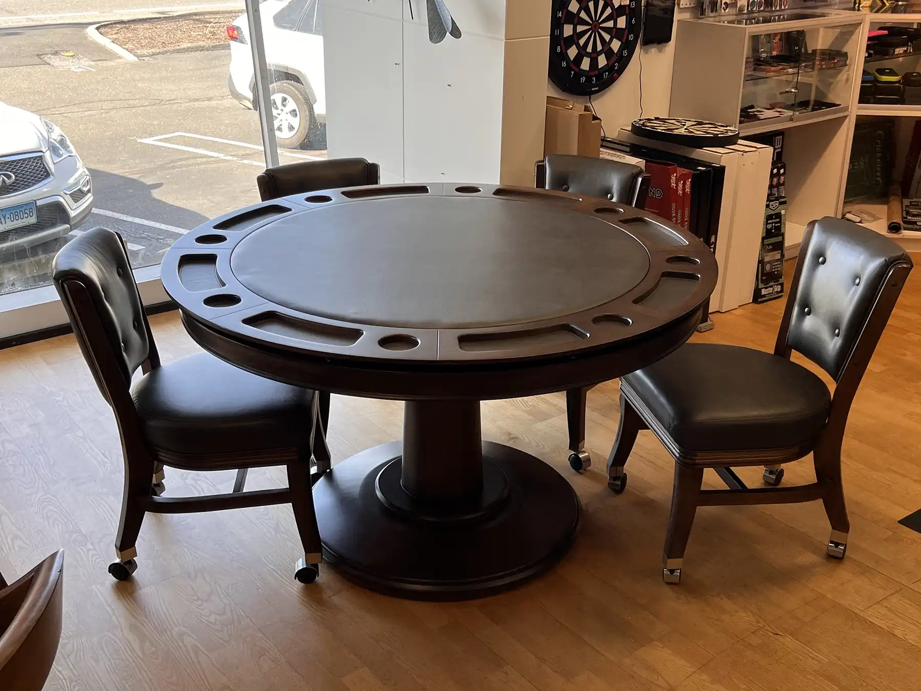 Mikhail Darafeev Liberty Model 2/1 Flip - Top 54" Octagon Card Table / Dining Table / Game Storage with a dark wood finish, featuring a round tabletop with cutouts and four matching chairs with casters.