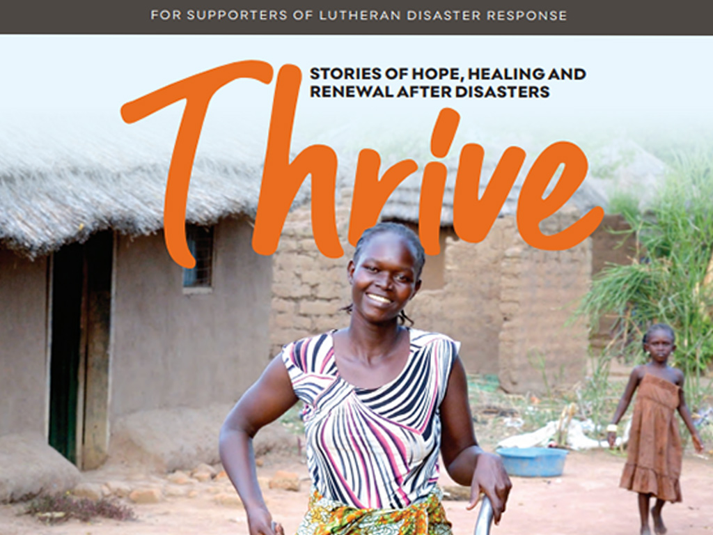 Magazine cover featuring a woman pushing a wheelbarrow with the word “Thrive” in orange letters over top.
