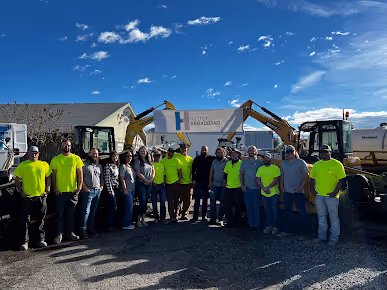 Hilltop broadband staff standing outside the Hilltop Broadband office for a group photo.